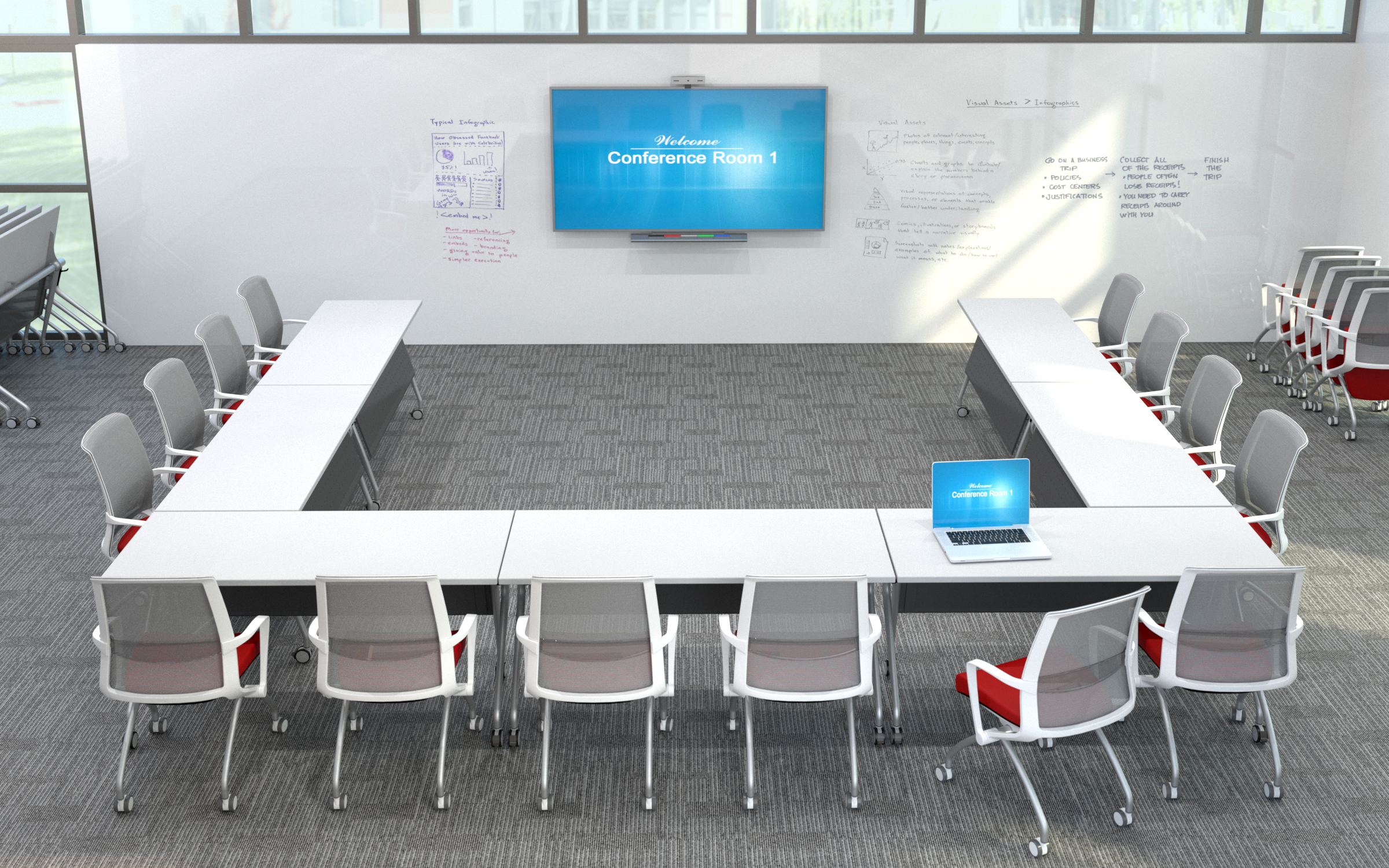 U-shaped conference table setup with white surfaces and gray chairs with red seats; laptop on a table; wall screen reads 'Welcome Conference Room 1'.