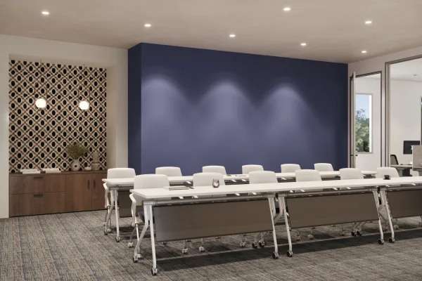 Large AMQ Concur training room with mobile flip-top tables