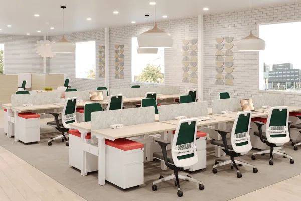 Large AMQ Kinex height-adjustable benching installation in an open office